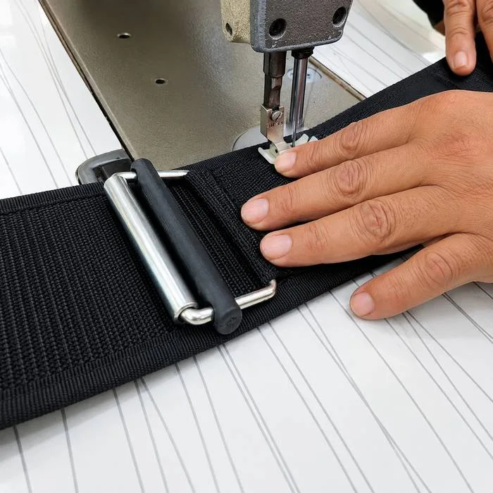 sewing a self locking weightlifting belt with precision in prohand industries facility